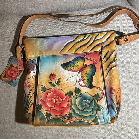 NWOT Anuschka Hand-Painted crossbody with adjustable strap - Picture 2 of 4
